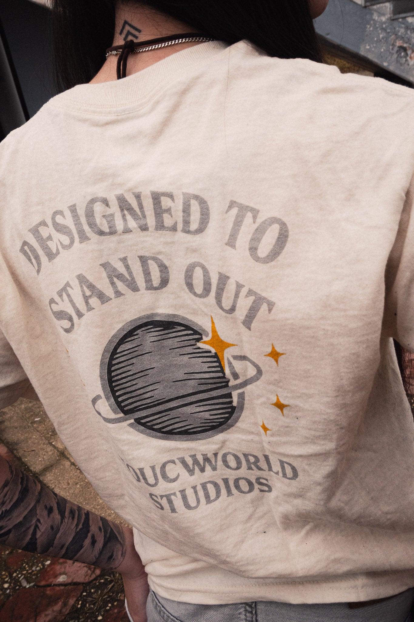 Toucworld® Essential Tee — Sandstone Heritage Edition